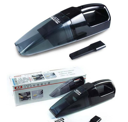 Aspirapolvere portatile tenuto in mano nero una garanzia di anno con la certificazione del Ce